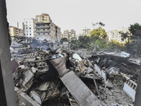 Damage occurs at the site of overnight Israeli airstrikes that target Beirut's southern suburb of Hadath in Beirut, Lebanon, on October 27,...