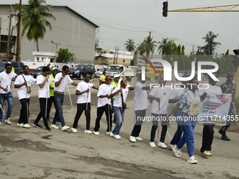 Officials and trainees of the Vocational Training Centre, Federal Nigeria Society for the Blind, Oshodi, participate in a sensitization walk...