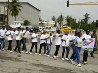 Officials and trainees of the Vocational Training Centre, Federal Nigeria Society for the Blind, Oshodi, participate in a sensitization walk...