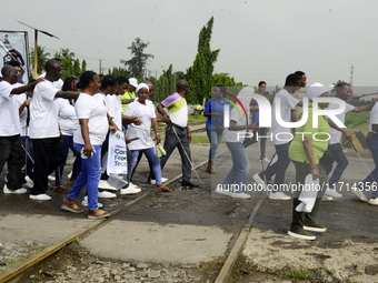 Officials and trainees of the Vocational Training Centre, Federal Nigeria Society for the Blind, Oshodi, participate in a sensitization walk...