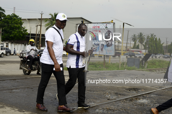 Officials and trainees of the Vocational Training Centre, Federal Nigeria Society for the Blind, Oshodi, participate in a sensitization walk...