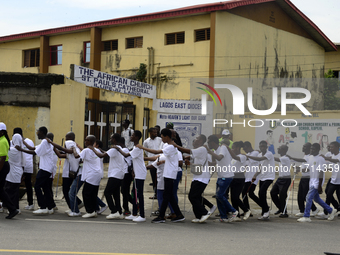 Officials and trainees of the Vocational Training Centre, Federal Nigeria Society for the Blind, Oshodi, participate in a sensitization walk...