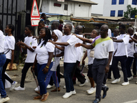 Officials and trainees of the Vocational Training Centre, Federal Nigeria Society for the Blind, Oshodi, participate in a sensitization walk...