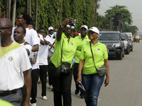 Officials and trainees of the Vocational Training Centre, Federal Nigeria Society for the Blind, Oshodi, participate in a sensitization walk...