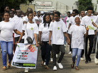 Officials and trainees of the Vocational Training Centre, Federal Nigeria Society for the Blind, Oshodi, participate in a sensitization walk...