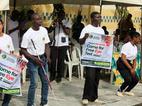 Officials and trainees of the Vocational Training Centre, Federal Nigeria Society for the Blind, Oshodi, participate in a sensitization walk...