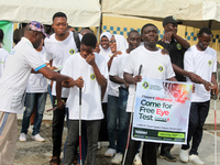 Officials and trainees of the Vocational Training Centre, Federal Nigeria Society for the Blind, Oshodi, participate in a sensitization walk...