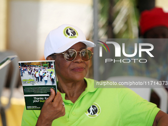 Arit Tunde-Imoyo, Chairman of the Executive Council of the Federal Nigeria Society for the Blind, looks on as the Federal Nigeria Society fo...