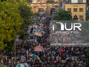 Over a thousand people buy new clothes, home decor, and other accessories in the old market as they throng the shopping hub before the bigge...