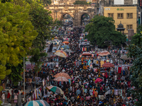 Over a thousand people buy new clothes, home decor, and other accessories in the old market as they throng the shopping hub before the bigge...