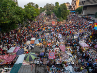 Over a thousand people buy new clothes, home decor, and other accessories in the old market as they throng the shopping hub before the bigge...