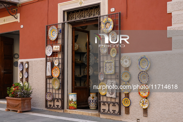 Ceramic decorated objects are displayed outside a shop in Deruta, Italy, on October 22nd, 2024. Deruta is the city par excellence of the art...