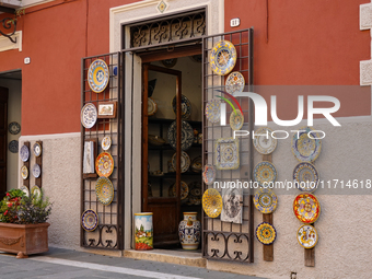 Ceramic decorated objects are displayed outside a shop in Deruta, Italy, on October 22nd, 2024. Deruta is the city par excellence of the art...