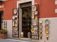 Ceramic decorated objects are displayed outside a shop in Deruta, Italy, on October 22nd, 2024. Deruta is the city par excellence of the art...