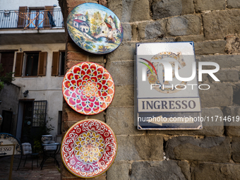 Ceramic decorated objects are displayed outside a shop in Deruta, Italy, on October 22nd, 2024. Deruta is the city par excellence of the art...