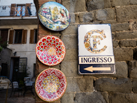 Ceramic decorated objects are displayed outside a shop in Deruta, Italy, on October 22nd, 2024. Deruta is the city par excellence of the art...