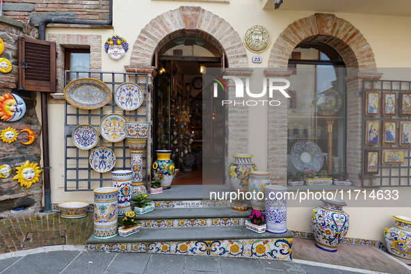 Ceramic decorated objects are displayed outside a shop in Deruta, Italy, on October 22nd, 2024. Deruta is the city par excellence of the art...