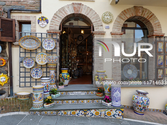 Ceramic decorated objects are displayed outside a shop in Deruta, Italy, on October 22nd, 2024. Deruta is the city par excellence of the art...