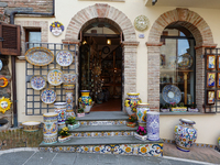 Ceramic decorated objects are displayed outside a shop in Deruta, Italy, on October 22nd, 2024. Deruta is the city par excellence of the art...