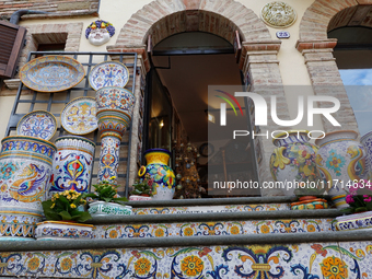 Ceramic decorated objects are displayed outside a shop in Deruta, Italy, on October 22nd, 2024. Deruta is the city par excellence of the art...