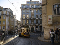 A tram moves through one of the streets of the Baixa district in Lisbon, Portugal, on October 27, 2024. (