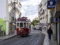 A tram moves through one of the streets of the Baixa district in Lisbon, Portugal, on October 27, 2024. (