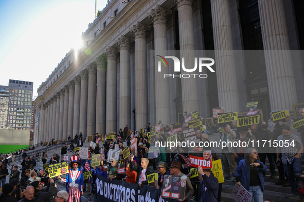 Demonstrators protest against Donald Trump outside of Madison Square Garden in New York, New York on October 27, 2024 as the former Presiden...