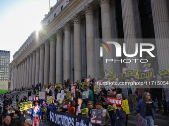 Demonstrators protest against Donald Trump outside of Madison Square Garden in New York, New York on October 27, 2024 as the former Presiden...