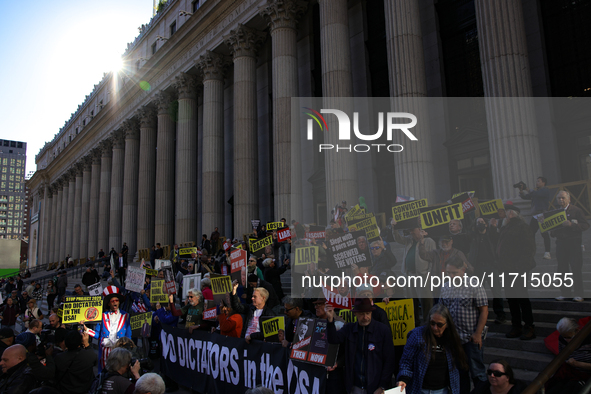 Demonstrators protest against Donald Trump outside of Madison Square Garden in New York, New York on October 27, 2024 as the former Presiden...