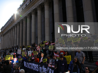 Demonstrators protest against Donald Trump outside of Madison Square Garden in New York, New York on October 27, 2024 as the former Presiden...