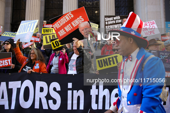 Demonstrators protest against Donald Trump outside of Madison Square Garden in New York, New York on October 27, 2024 as the former Presiden...