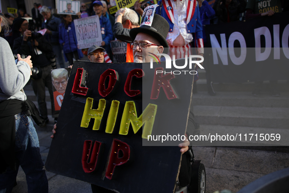 Demonstrators protest against Donald Trump outside of Madison Square Garden in New York, New York on October 27, 2024 as the former Presiden...