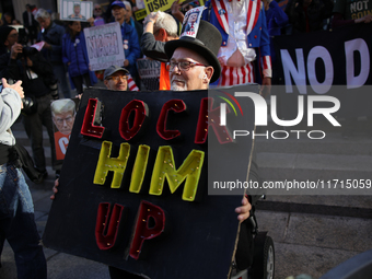 Demonstrators protest against Donald Trump outside of Madison Square Garden in New York, New York on October 27, 2024 as the former Presiden...