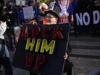 Demonstrators protest against Donald Trump outside of Madison Square Garden in New York, New York on October 27, 2024 as the former Presiden...