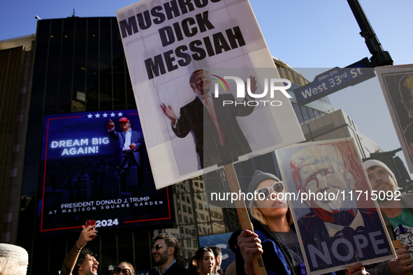 Demonstrators protest against Donald Trump outside of Madison Square Garden in New York, New York on October 27, 2024 as the former Presiden...