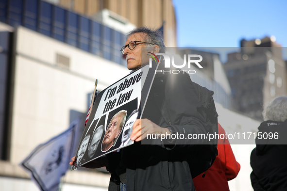 Demonstrators protest against Donald Trump outside of Madison Square Garden in New York, New York on October 27, 2024 as the former Presiden...