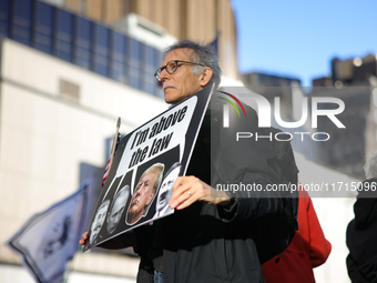 Demonstrators protest against Donald Trump outside of Madison Square Garden in New York, New York on October 27, 2024 as the former Presiden...