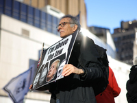 Demonstrators protest against Donald Trump outside of Madison Square Garden in New York, New York on October 27, 2024 as the former Presiden...