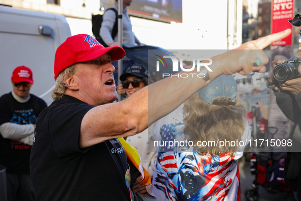 A supporter of Donald Trump argues with anti-Trump demonstrators outside of Madison Square Garden in New York, New York on October 27, 2024...