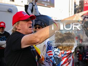 A supporter of Donald Trump argues with anti-Trump demonstrators outside of Madison Square Garden in New York, New York on October 27, 2024...