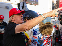 A supporter of Donald Trump argues with anti-Trump demonstrators outside of Madison Square Garden in New York, New York on October 27, 2024...