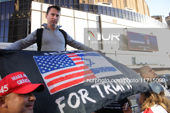 Supporters of Donald Trump gather outside of Madison Square Garden in New York, New York on October 27, 2024 as the former President holds...