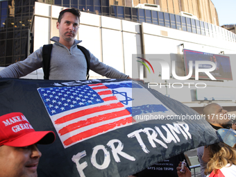 Supporters of Donald Trump gather outside of Madison Square Garden in New York, New York on October 27, 2024 as the former President holds...