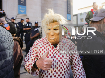 Demonstrators protest against Donald Trump outside of Madison Square Garden in New York, New York on October 27, 2024 as the former Presiden...