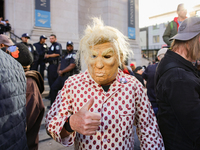 Demonstrators protest against Donald Trump outside of Madison Square Garden in New York, New York on October 27, 2024 as the former Presiden...