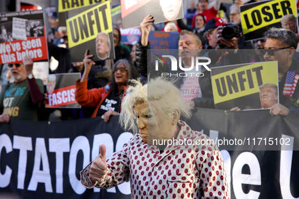 Demonstrators protest against Donald Trump outside of Madison Square Garden in New York, New York on October 27, 2024 as the former Presiden...