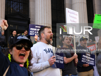 Demonstrators protest against Donald Trump outside of Madison Square Garden in New York, New York on October 27, 2024 as the former Presiden...