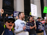 Demonstrators protest against Donald Trump outside of Madison Square Garden in New York, New York on October 27, 2024 as the former Presiden...