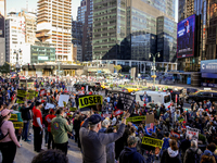 Demonstrators protest against Donald Trump outside of Madison Square Garden in New York, New York on October 27, 2024 as the former Presiden...