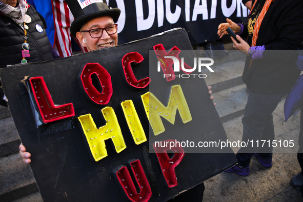 Demonstrators protest against Donald Trump outside of Madison Square Garden in New York, New York on October 27, 2024 as the former Presiden...